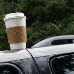 Coffee cup left on the top of a car