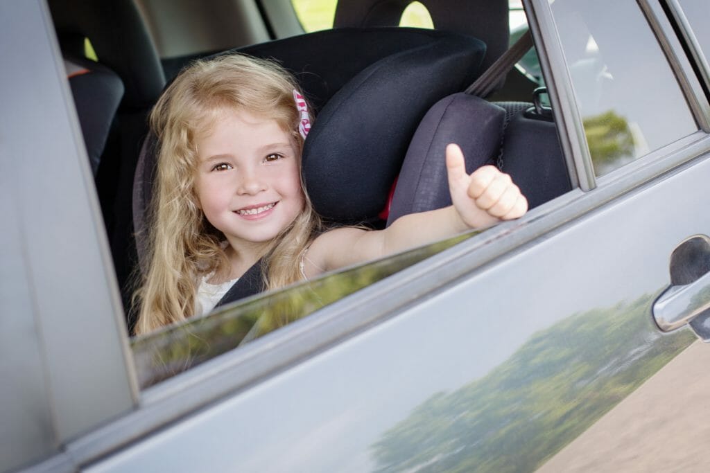 child in carpool van