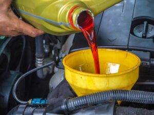 why is transmission fluid leaking beneath the vehicle?